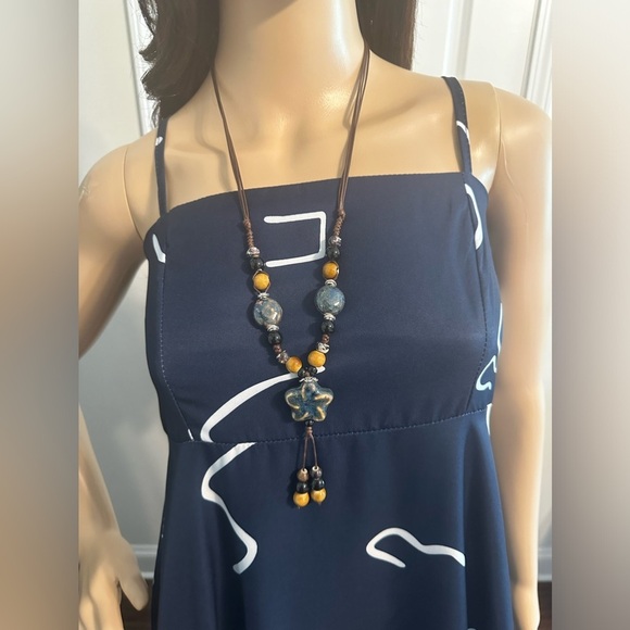 Boho-Chic Adjustable Ceramic Bead Necklace with Floral Design - Picture 5 of 5